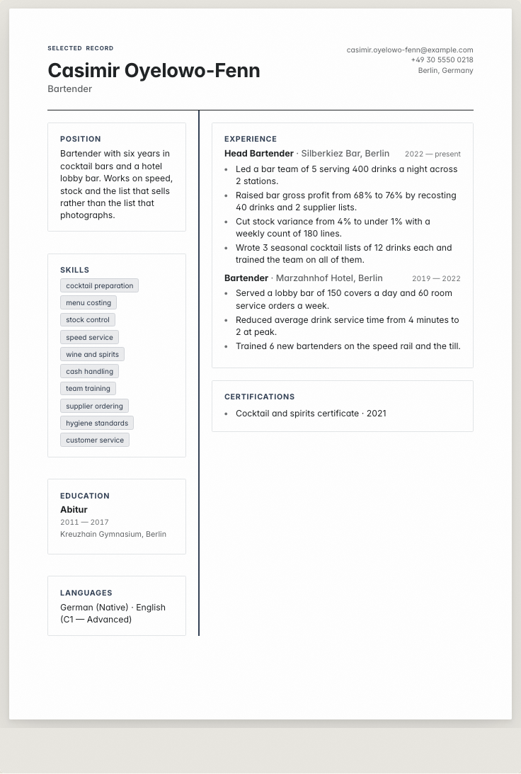 The bartender example résumé drawn as a complete page in the Keyline design: name, summary, the roles with their bullet lines, education and a skills row